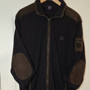 This  is a Paul & Shark wool full-zip sweater featuring contrast brown Suede